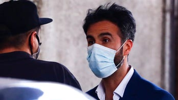 Investigators search doctor's office, probing Maradona death