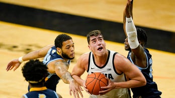 Nearly perfect Garza scores 41, No. 5 Iowa routs Southern
