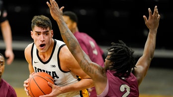 Garza, McCaffery help No. 5 Iowa rout NC Central in opener