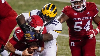 Jim Harbaugh, Michigan survive 3 OT thriller against Rutgers