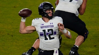 Ramsey's 3 TD passes lead No. 23 Wildcats past Purdue 27-20