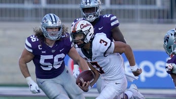 No. 14 Oklahoma State holds off Kansas State, 20-18