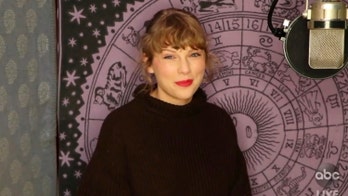 Taylor Swift wins big at AMAs, says she's busy rerecording all of her 'old music'