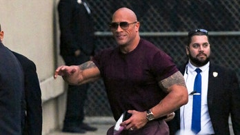 Dwayne Johnson can't fit into Porsche Taycan electric sport sedan during shoot for film 'Red Notice'