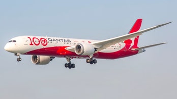 Qantas airline plans to require coronavirus vaccine for international travel, CEO says