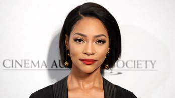 Natasha Marc working with a former Navy SEAL to help hurricane victims in Louisiana