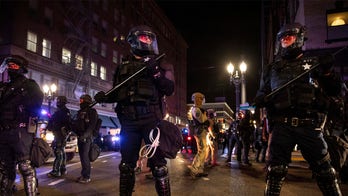 Portland police declare riot as city’s unrest carries into new year