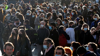 WHO updates coronavirus face mask guidance, says face shields are inferior alternative