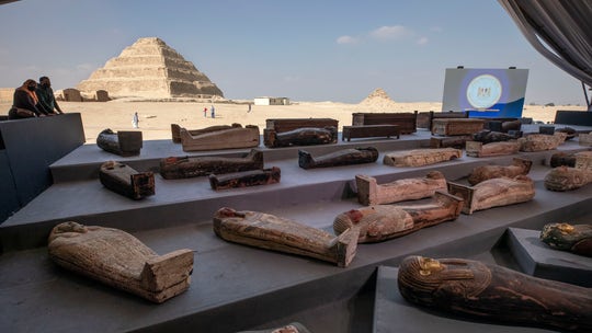 Egypt unveils ancient coffins, statues found in Saqqara