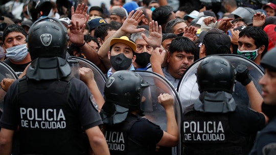 Thousands bid farewell to Maradona in Argentina amid clashes