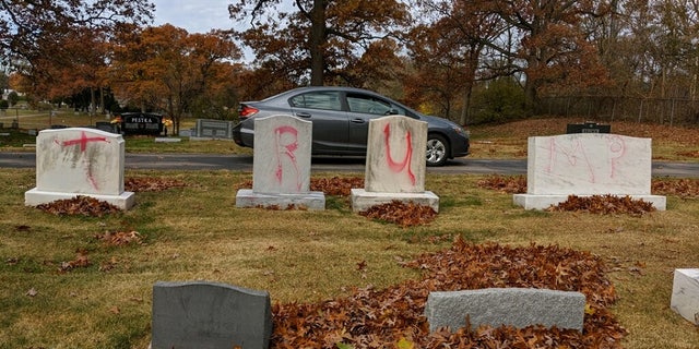 Jewish headstones were found desecrated Monday with pro-Trump slogans inside a Grand Rapids, Mich., Jewish cemetery.