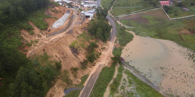 A road is blocked by a landslide in Purulha, northern Guatemala Nov. 6. As the remnants of Hurricane Eta moved back over Caribbean waters, governments in Central America worked to tally the displaced and dead, and recover bodies from landslides and flooding that claimed dozens of lives from Guatemala to Panama. (AP Photo/Santiago Billy)