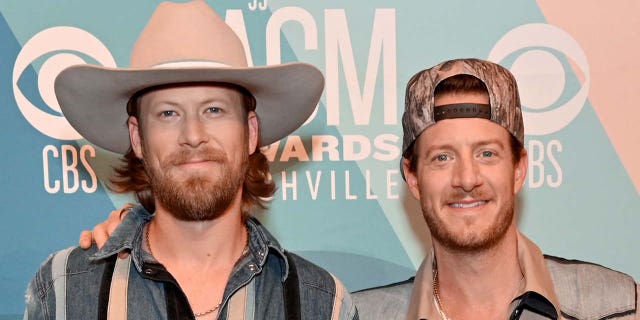 Left to right: Brian Kelley and Tyler Hubbard of Florida Georgia Line are the subjects of a rumored political feud. (Photo by Jason Kempin/ACMA2020/Getty Images for ACM)