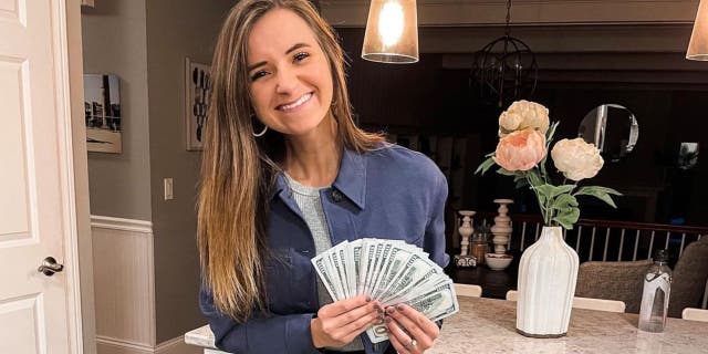 Alyssa Greene poses with the tip money on her Instagram before giving it to the staff at Va Bene.