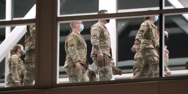 An undisclosed number of National Guard troops arrived in Chicago on Monday night in advance of any election-related civil unrest.