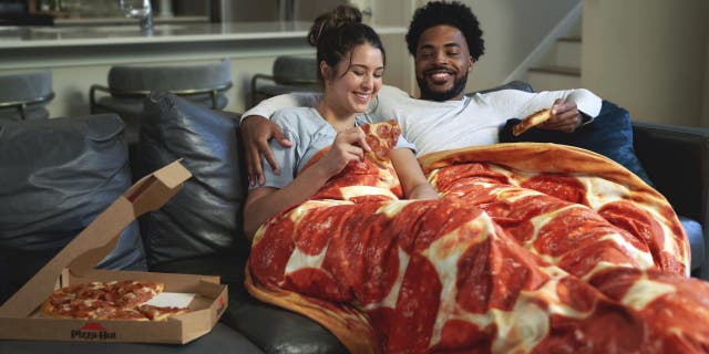 The blanket has a 72-inch diameter and weighs 15 pounds.