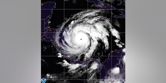 This satellite image made available by NOAA shows Hurricane Iota in the North Atlantic Ocean on Monday, Nov. 16, 2020, at 07:11 EST. (NOAA via AP)
