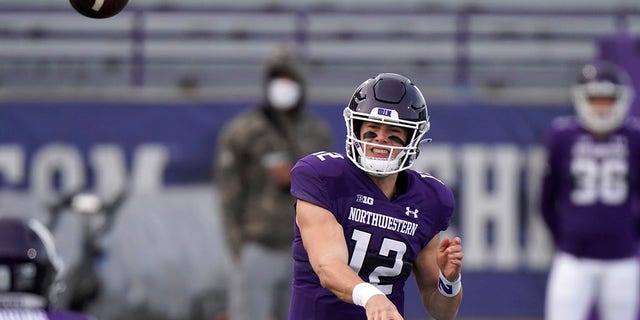 Northwestern quarterback Peyton Ramsey throws a pass during the first half of an NCAA college football game against Wisconsin in Evanston, Ill., Saturday, Nov. 21, 2020. Northwestern won 17-7. (AP Photo/Nam Y. Huh)