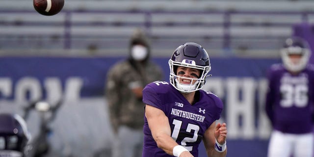 Northwestern quarterback Peyton Ramsey throws a pass during the first half of an NCAA college football game against Wisconsin in Evanston, Ill., Saturday, Nov. 21, 2020. Northwestern won 17-7. (AP Photo/Nam Y. Huh)