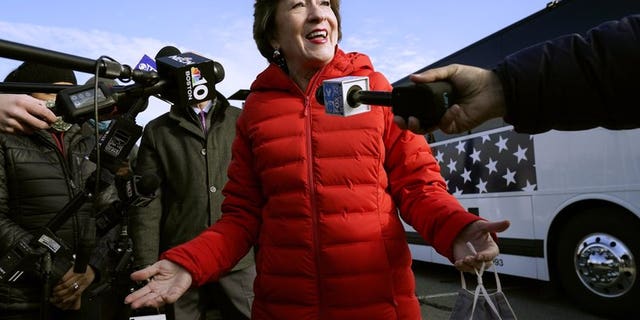 FILE - In this Nov. 4, 2020, file photo Republican Sen. Susan Collins, R-Maine, speaks to reporters in Bangor, Maine. (AP Photo/Robert F. Bukaty, File)