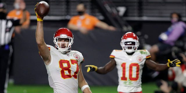 Kansas City Chiefs tight end Travis Kelce (87) celebrates after scoring a touchdown against the Las Vegas Raiders during the second half of an NFL football game, Sunday, Nov. 22, 2020, in Las Vegas. (AP Photo/Isaac Brekken)
