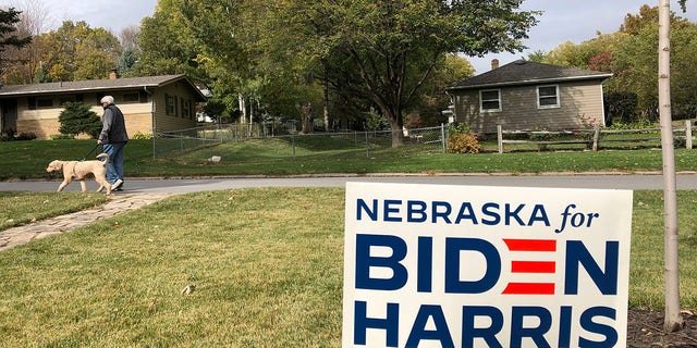A Joe Biden presidential campaign sign greets passersby in a leafy neighborhood of Omaha, Neb., Monday, Oct. 19, 2020. (Associated Press)