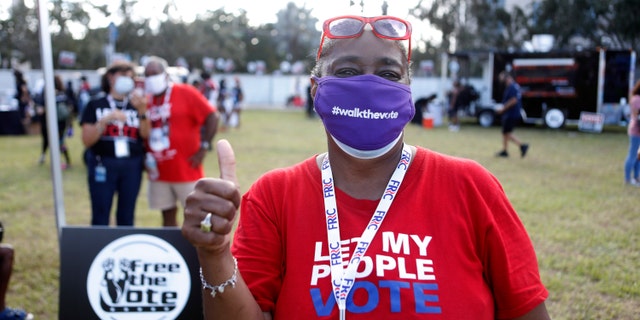Participants at voting parades on Saturday, Oct. 24, 2020, in Orlando, Fla. (Octavio Jones/AP Images for #walkthevote)