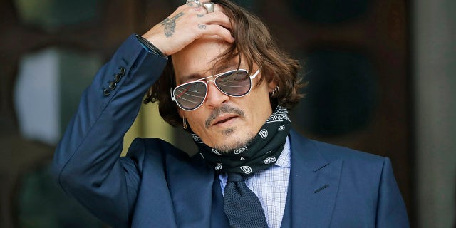 Johnny Depp settled a lawsuit stemming from an alleged assault on set of "City of Lies" in 2017. Depp was pictured in 2020