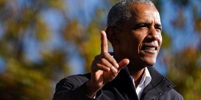 Former President Barack Obama speaks at a rally as he campaigns for Democratic presidential candidate former Vice President Joe Biden, Monday, Nov. 2, 2020, at Turner Field in Atlanta.