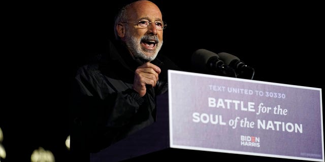 Pennsylvania Gov. Tom Wolf speaks during a drive-in rally for Democratic presidential candidate former Vice President Joe Biden at Heinz Field, Monday, Nov. 2, 2020, in Pittsburgh. (AP Photo/Andrew Harnik)
