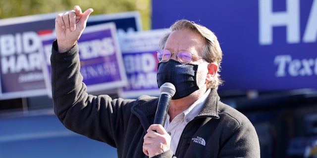 Sen. Gary Peters, D-Mich., speaks at a campaign event before Democratic vice presidential candidate Sen. Kamala Harris, D-Calif., Tuesday, Tuesday, Nov. 3, 2020, in Southfield, Mich. (AP Photo/Carlos Osorio)