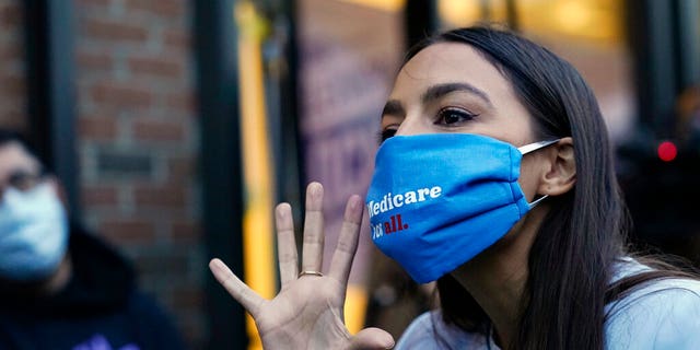 U.S. Representative Alexandria Ocasio-Cortez, DN.Y., speaks to her staff and volunteers who helped get the vote out and with her campaign, Nov. 3, outside her office in the Bronx neighborhood of New York City.  (AP Photo / Kathy Willens)