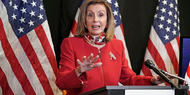 Speaker of the House Nancy Pelosi, D-Calif., talks to reporters about Election Day results in races for the House of Representatives, at Democratic National Committee headquarters in Washington, Tuesday, Nov. 3, 2020. (AP Photo/J. Scott Applewhite, Pool)