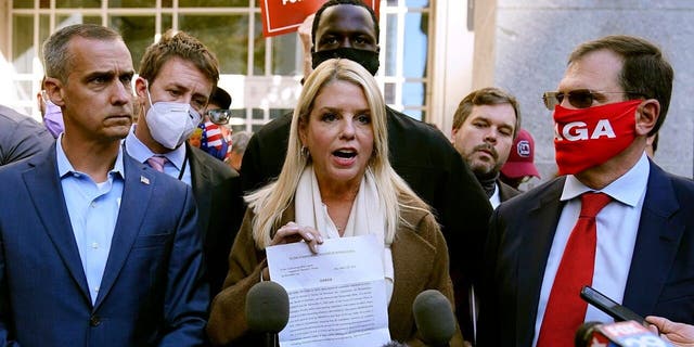 Former Florida Attorney General Pam Bondi displays a court order granting President Trump's campaign greater access to vote counting operations at the Pennsylvania Convention Center on Thursday, November 5, 2020, in Philadelphia.  (AP Photo / Matt Slocum)