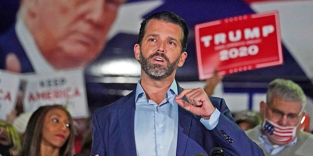 Donald Trump Jr., gestures as he speaks during a news conference at Georgia Republican Party headquarters Nov. 5, 2020, in Atlanta. 