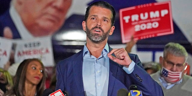 Donald Trump Jr., gestures as he speaks during a news conference at Georgia Republican Party headquarters Nov. 5, 2020, in Atlanta. 