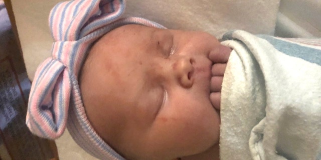 Maggie Schwandt was born on Nov. 5 in Grand Rapids, Michigan. She has 14 older brothers. (Jay Schwandt via AP)