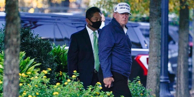 President Donald Trump arrives at the White House after golfing Nov. 7, in Washington. (AP Photo/Evan Vucci)