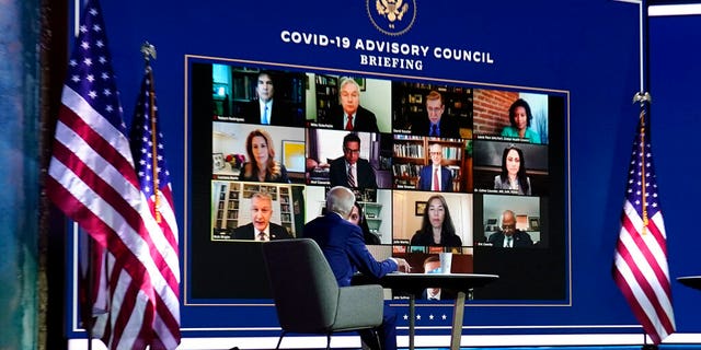 President-elect Joe Biden listens during a meeting with Biden's COVID-19 advisory council, Monday, Nov. 9, 2020, at The Queen theater in Wilmington, Del. (AP Photo/Carolyn Kaster)