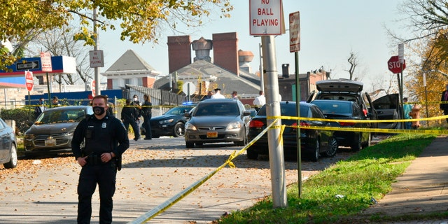 Baltimore police investigate the scene of a shooting in the city's Rosemont neighborhood Monday morning, Nov. 9, 2020. (Amy Davis/The Baltimore Sun via AP)