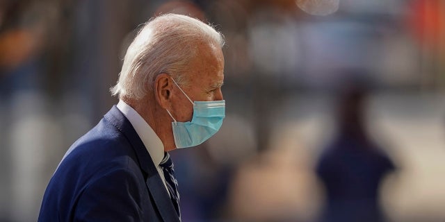 President-elect Joe Biden arrives at The Queen theater, Tuesday, Nov. 10, 2020, in Wilmington, Del. (AP Photo/Carolyn Kaster)