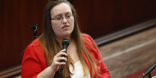 In this Feb. 1, 2018, file photo, Oklahoma state Dem. Sen. Allison Ikley-Freeman speaks during her swearing-in ceremony in Oklahoma City. (AP Photo/Sue Ogrocki, File)