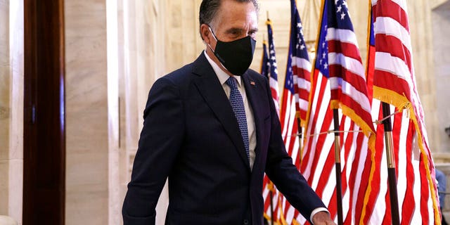 Sen. Mitt Romney, R-Utah, departs after the Republican Conference held leadership elections, on Capitol Hill in Washington, D.C., on Nov. 10, 2020. (AP Photo/J. Scott Applewhite)