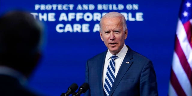 President-elect Joe Biden answers a question from a reporter at the Queen Theater, Nov. 10, in Wilmington, Del.  (AP Photo / Carolyn Kaster)