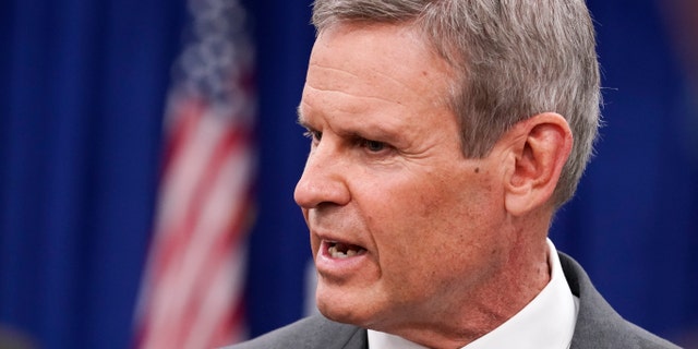 Tennessee Gov. Bill Lee talks with reporters Tuesday, Nov. 10, 2020, in Nashville, Tenn. Lee said Tuesday he's looking to include "meaningful" teacher pay raises in next year's budget despite facing financial crunches brought on by the COVID-19 pandemic. (AP Photo/Mark Humphrey)