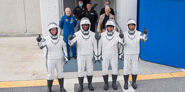 NASA astronauts, from left, Shannon Walker, Victor Glover, Mike Hopkins, and Japan Aerospace Exploration Agency (JXAA) astronaut Soichi Noguchi, right, wearing a SpaceX spacesuit, Neil A. Armstrong a photo to exit operations and checkout Stop posing for Departure for Complex 39A launched during a dress rehearsal on Thursday, November 12, 2020 at NASA's Kennedy Space Center in Cape Canaveral, Fla.