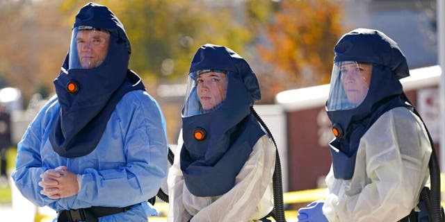 Salt Lake County Health Department nurses monitor coronavirus testing outside the Salt Lake County Health Department on Thursday.  (AP Photo / Rick Bowmer)