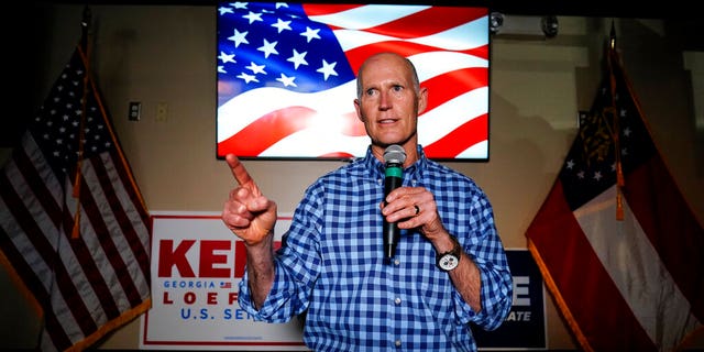 Senator Rick Scott, R-Fla. Kelly Loeffler Speaks at the Campaign Meeting of Republican Candidates for the U.S. Senate and Senator David Perdue on Friday, November 13, 2020 in Cumming, Ga. (AP Photo / Brynn Anderson)