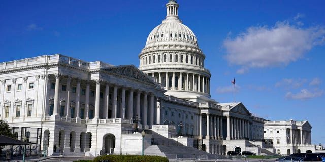 In this Nov. 2, 2020, file photo sunlight shines on the U.S. Capitol building on Capitol Hill in Washington. With the House of Representatives nearly evenly split, both Republicans and Democrats in state legislatures are gerrymandering congressional districts to give their parties an advantage in the midterms. 