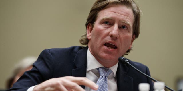 In this May 22, 2019 file photo, Christopher Krebs, director of the Cybersecurity and Infrastructure Security Agency, testifies on Capitol Hill in Washington.  President Trump on Tuesday, November 17, 2020 fired Krebs, the director of the federal agency who vouched for the reliability of the 2020 election. Trump sacked Krebs in a tweet, saying his recent statement defending security election was 